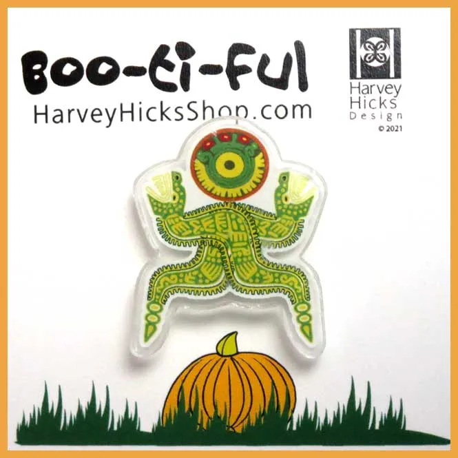 Halloween pin featuring an illustration of a tawny owl