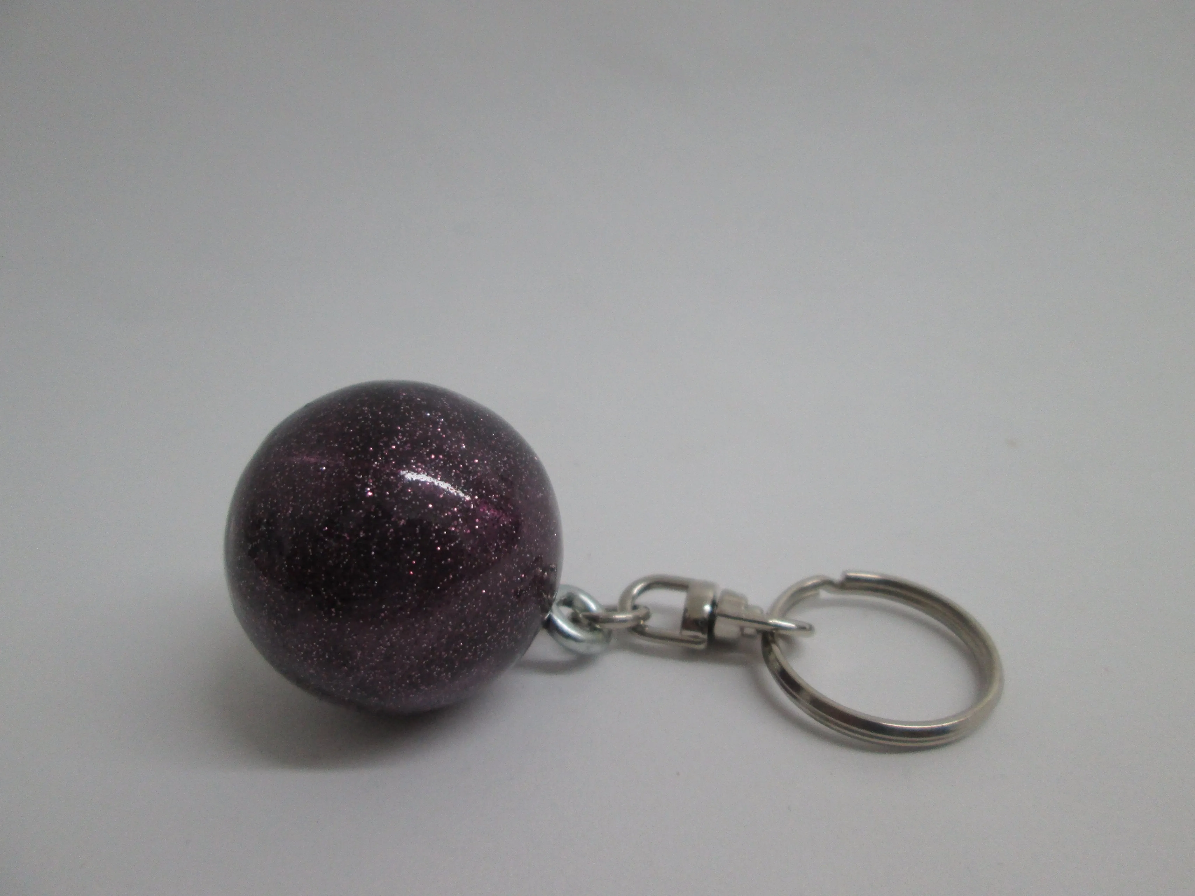 Llaveros de pelotas metálicas con glitter Pastorelli
