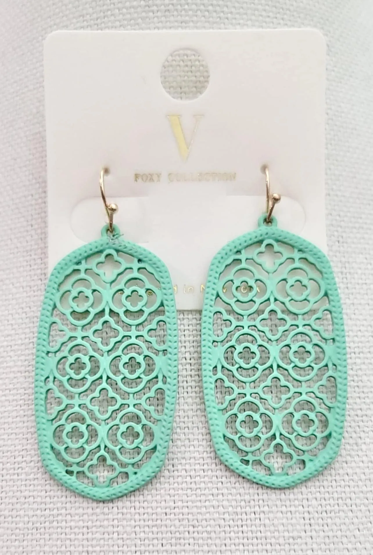Mint lattice cutout oval earrings